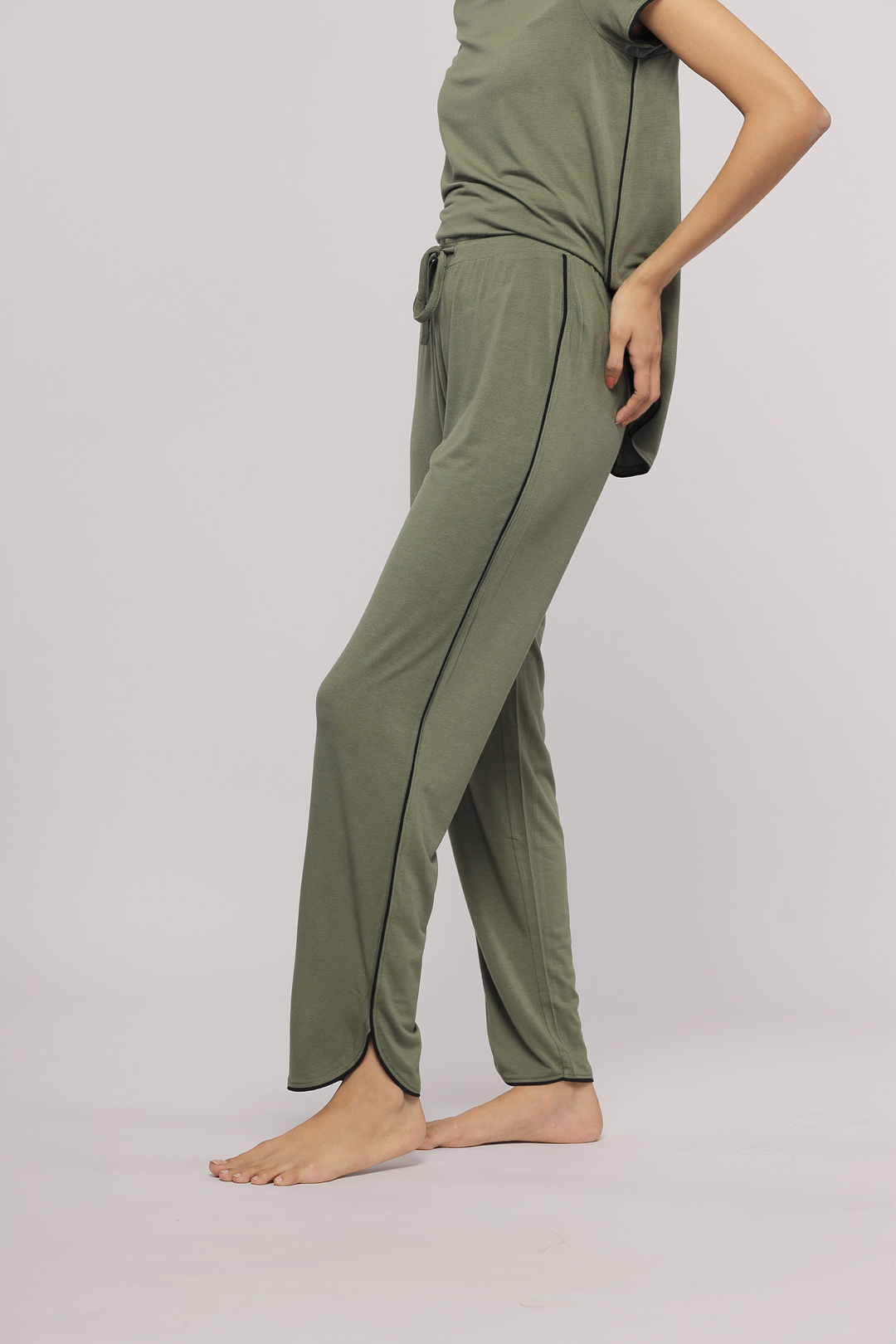 Olive green multipurpose top and matching pants for casual wear.