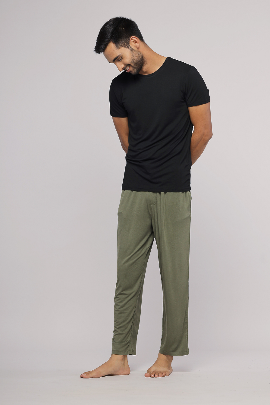 Army green men's lounge set with black t-shirt and relaxed pants.