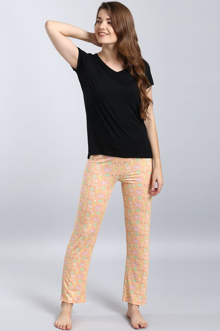 Dreamy Weekend Pajama Set with cute printed pants and black top.